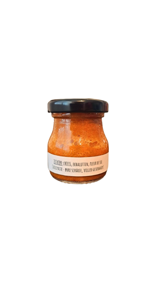 Rückseite der Flame Fusion Chilipaste – Zutatenliste und Anwendungshinweise für die natürliche, scharfe Chilipaste, perfekt für die scharfe Küche.